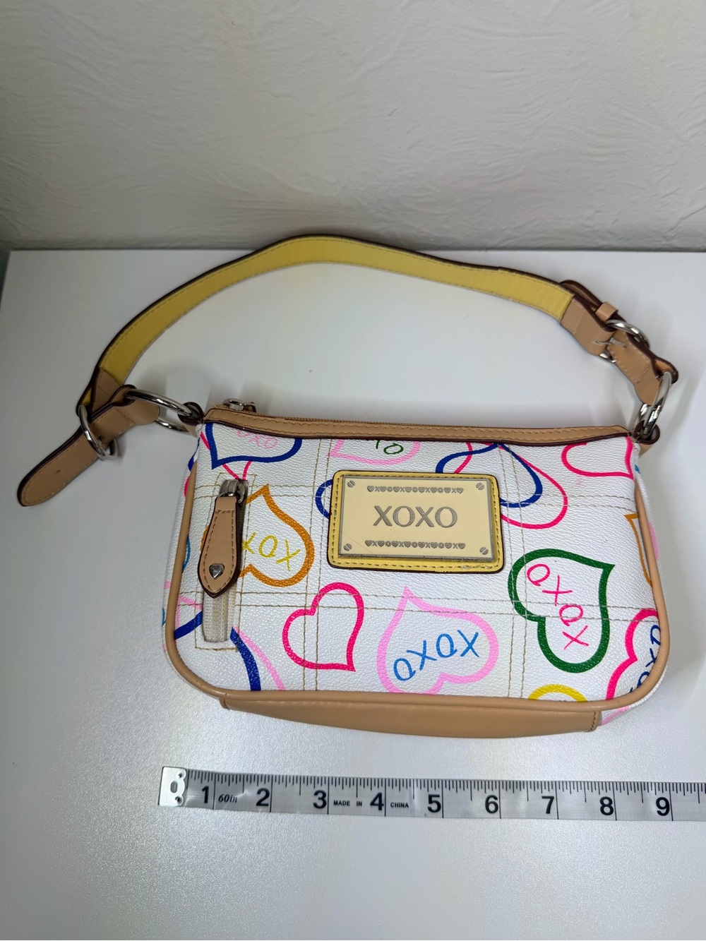 XOXO White Multicolor Heart Print Wristlet with Tan Trim